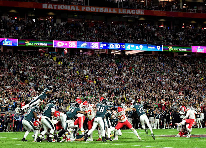 Harrison Butker kicks the game-winning field goal in Super Bowl LVII